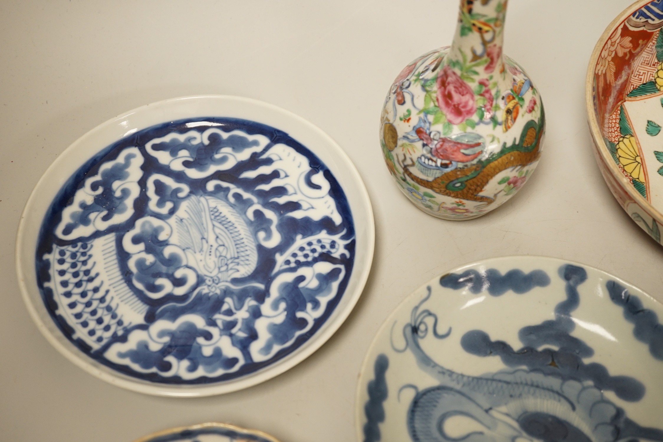 A Chinese famille rose bottle vase, 17cm tall, together with a group of oriental porcelain